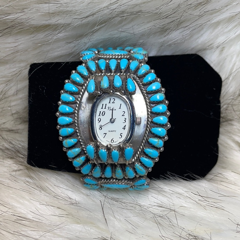 Vintage Navajo sterling turquoise watch cuff. 61 stones, hallmarked.